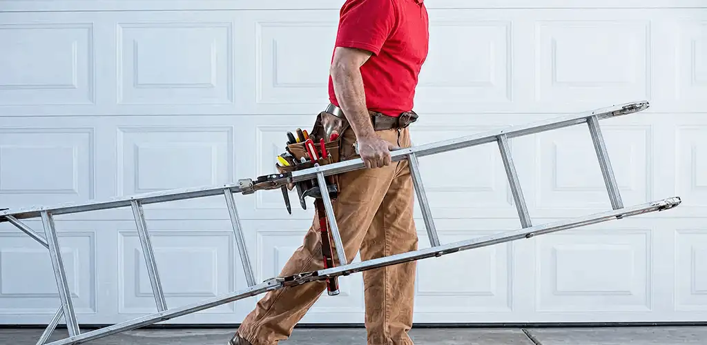 Garage door repair technician arriving with tools and ladder in Austin, TX