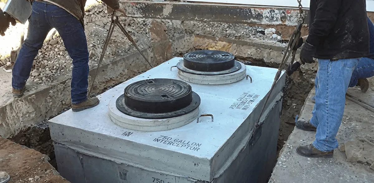 Grease trap installation for a commercial property drainage system in Austin, TX