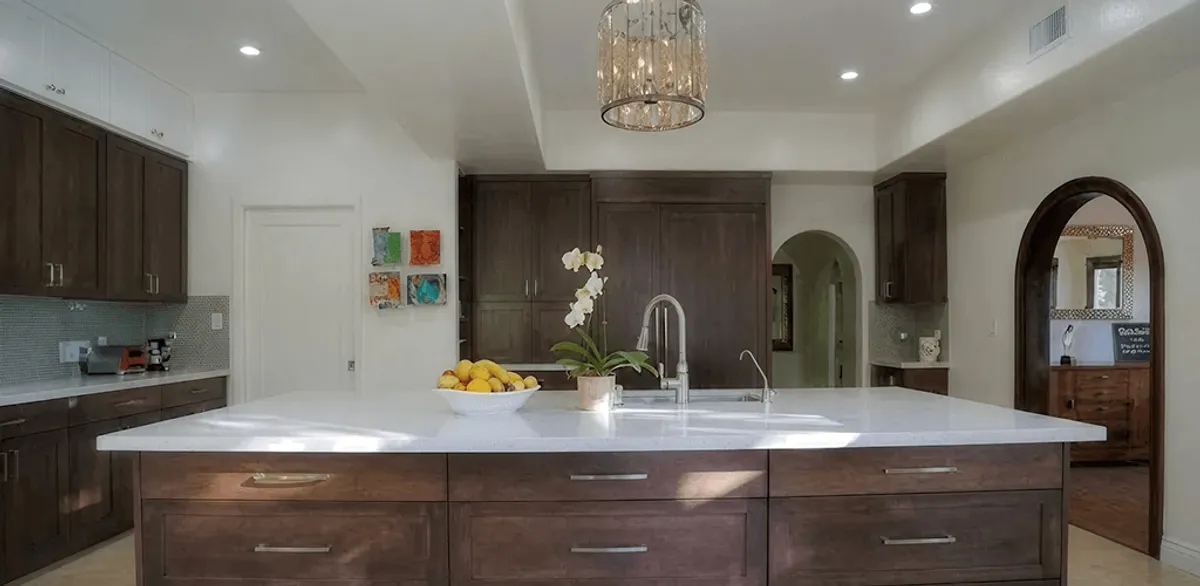 Cabinet refacing project with updated kitchen cabinets and island in Austin, TX